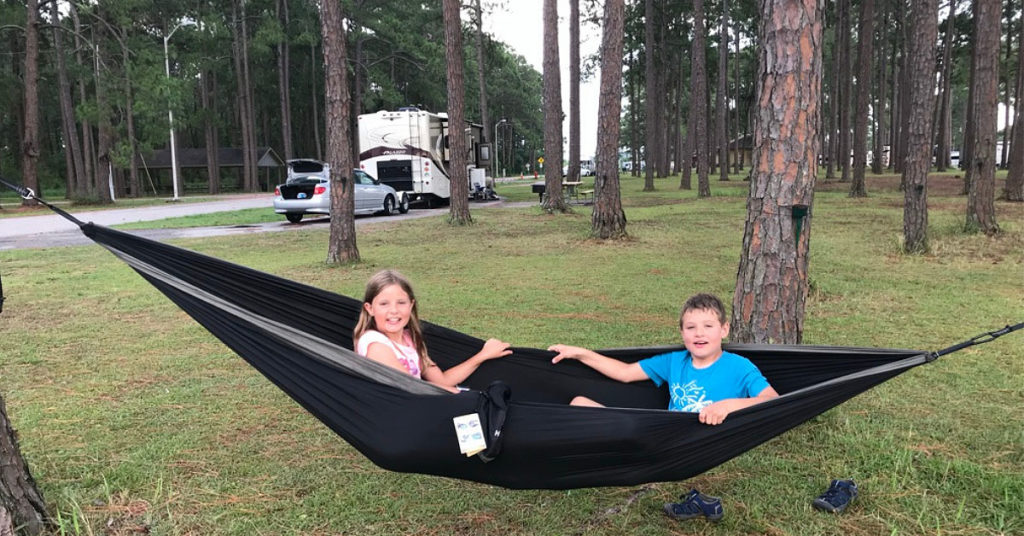 kids in black hammock